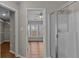 Bathroom area with a clear view of a shower and the bedroom at 4263 Winslow Hill Ct, Suwanee, GA 30024