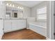 Bathroom features granite counters, soaking tub, and great lighting at 4263 Winslow Hill Ct, Suwanee, GA 30024