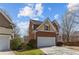 Front exterior view showing garage and brick and siding details at 4263 Winslow Hill Ct, Suwanee, GA 30024
