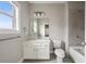 Bathroom with a single sink vanity, toilet, and shower-tub combination at 2285 Moondance Ln, Marietta, GA 30062