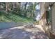 Spacious stone patio with outdoor seating, perfect for enjoying backyard views and entertaining at 4234 Long Branch Ne Ct, Brookhaven, GA 30319