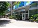 Inviting building entrance featuring lush greenery, modern design, and prime location in the city at 1080 Peachtree Ne St # 2207, Atlanta, GA 30309