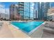 Resort-style pool with lounge chairs provides a relaxing retreat with stunning city views at 1080 Peachtree Ne St # 2207, Atlanta, GA 30309