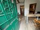 Entryway with a table and chairs, and a view to the kitchen at 3118 Rockbridge Road Southwest, Avondale Estates, GA 30002