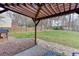 Large, green backyard featuring a pergola and playhouse at 3852 Old Bridge Way, Duluth, GA 30096