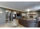 Inviting living room featuring a stone fireplace, exposed beams, and comfortable seating at 3852 Old Bridge Way, Duluth, GA 30096