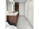 Modern bathroom with dark wood cabinets, a white marble countertop, and stylish fixtures at 4103 Statewood Ne Rd, Atlanta, GA 30342