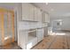 Kitchen featuring cabinets, doors, and an open entryway into another room at 4103 Statewood Ne Rd, Atlanta, GA 30342