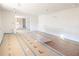 Bright, open living room featuring a large entryway and construction paper on the floor at 4103 Statewood Ne Rd, Atlanta, GA 30342