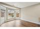 Charming breakfast nook with large windows and hardwood floors at 6445 Glen Oaks Ln, Atlanta, GA 30328