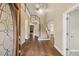 Elegant foyer with hardwood floors, staircase, and chandelier at 6445 Glen Oaks Ln, Atlanta, GA 30328