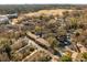 Apartment complex aerial view near a golf course with mature trees and beautiful landscaping at 100 Biscayne Nw Dr # E1, Atlanta, GA 30309