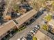 Aerial view of apartment complex with parking, landscaping and surrounding neighborhood at 100 Biscayne Nw Dr # E1, Atlanta, GA 30309