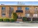 Attractive brick apartment building with well-manicured landscaping at 100 Biscayne Nw Dr # E1, Atlanta, GA 30309