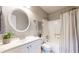 Bathroom with shower/tub, updated fixtures, and neutral-colored decor at 2336 Vistamont Dr, Decatur, GA 30033