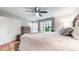 Bright bedroom featuring hardwood floors, neutral walls, and a ceiling fan at 2336 Vistamont Dr, Decatur, GA 30033