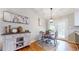 Cozy dining area featuring hardwood floors, a round table, and stylish decor at 2336 Vistamont Dr, Decatur, GA 30033