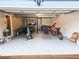 Organized garage space with a boat, motorcycle, and ample storage at 2336 Vistamont Dr, Decatur, GA 30033