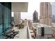 Balcony with outdoor seating, with scenic views of the city skyline at 40 12Th Ne St # 1503, Atlanta, GA 30309