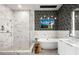 Modern bathroom with a walk-in shower, a soaking tub, and sleek contemporary design at 40 12Th Ne St # 1503, Atlanta, GA 30309