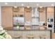 Well-lit kitchen with modern appliances, seating at the island, and contemporary design at 40 12Th Ne St # 1503, Atlanta, GA 30309