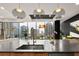 Open kitchen with views, center island, and stainless steel appliances at 40 12Th Ne St # 1503, Atlanta, GA 30309