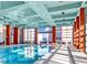 Beautiful indoor pool with seating and access to lounge area at 40 12Th Ne St # 1503, Atlanta, GA 30309