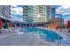 Luxury swimming pool with lounge chairs and city views, perfect for relaxation and entertainment at 40 12Th Ne St # 1503, Atlanta, GA 30309