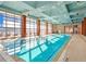 Indoor pool area with large windows and lounge chairs at 40 12Th Ne St # 1503, Atlanta, GA 30309