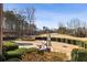 Private backyard with a pool, cabana, lounge chairs, and serene golf course views at 6955 Laurel Oak Dr, Suwanee, GA 30024