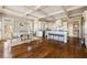 Bright kitchen with a center island, white cabinets, and adjacent dining area with natural light at 6955 Laurel Oak Dr, Suwanee, GA 30024