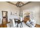 Beautiful home office with French doors leading to the dining room at 6955 Laurel Oak Dr, Suwanee, GA 30024