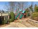 Outdoor playground with swings and slides, perfect for Gathering fun and recreation at 6955 Laurel Oak Dr, Suwanee, GA 30024