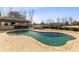 A sparkling pool with stone patio, outdoor bar, and fire pit for ultimate relaxation at 6955 Laurel Oak Dr, Suwanee, GA 30024