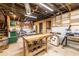 Unfinished basement workshop with an array of woodworking tools and storage at 126 Greenwood Pl, Decatur, GA 30030