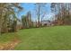 Spacious backyard features a large, level grassy area at 1429 Christiana Dr, Lawrenceville, GA 30043