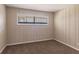 Cozy carpeted bedroom with natural light from a large window at 3517 Hyland Dr, Decatur, GA 30032