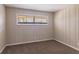 Bright bedroom featuring neutral walls and a window with blinds at 3517 Hyland Dr, Decatur, GA 30032