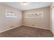 Spacious bedroom with carpet floors, natural light, and closet space at 3517 Hyland Dr, Decatur, GA 30032