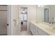 Neutral bathroom with double sinks, white cabinets and a shower/tub combo for a clean aesthetic at 1270 Seale Dr, Alpharetta, GA 30022