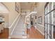 Grand two-story foyer with hardwood floors, staircase, and abundant natural light at 1270 Seale Dr, Alpharetta, GA 30022