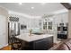 Bright kitchen featuring stainless steel appliances, a large island, and white cabinetry at 1270 Seale Dr, Alpharetta, GA 30022