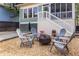 Backyard gravel area featuring a fire pit and outdoor seating at 902 E Ponce De Leon Ave, Decatur, GA 30030