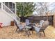 Backyard gravel area featuring a fire pit and outdoor seating at 902 E Ponce De Leon Ave, Decatur, GA 30030