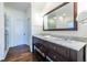 Elegant bathroom with dual vanity, marble countertop, large mirror, and walk-in shower at 902 E Ponce De Leon Ave, Decatur, GA 30030