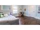 Bedroom featuring wood floors, a daybed, a window with natural light, and a desk at 902 E Ponce De Leon Ave, Decatur, GA 30030