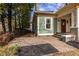 Charming home featuring paved walkway and verdant landscaping at 902 E Ponce De Leon Ave, Decatur, GA 30030