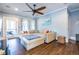 Inviting living room with hardwood floors, natural light, ceiling fan, and comfortable furnishings at 902 E Ponce De Leon Ave, Decatur, GA 30030