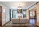 Bright living room with hardwood floors, fireplace, and sliding barn door at 902 E Ponce De Leon Ave, Decatur, GA 30030