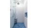 Shower boasting blue mosaic tile flooring, subway tile walls, a glass door, and a niche for toiletries at 902 E Ponce De Leon Ave, Decatur, GA 30030